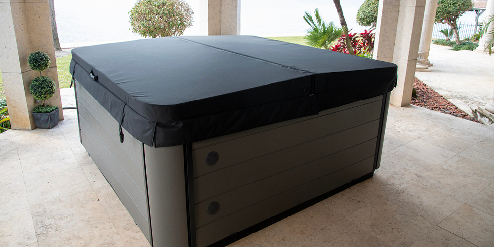 Precision 7 hot tub by MasterSpas with a cover.